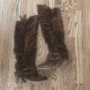 Over the knee fringe boots